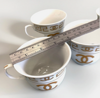 New Chanel Gold & White Ceramic China Teacups Set Of 4
